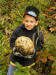 200510229840 Benjamin with Giant Puffball Mushroom (Calvatia gigantea) - Oakland Co.jpg